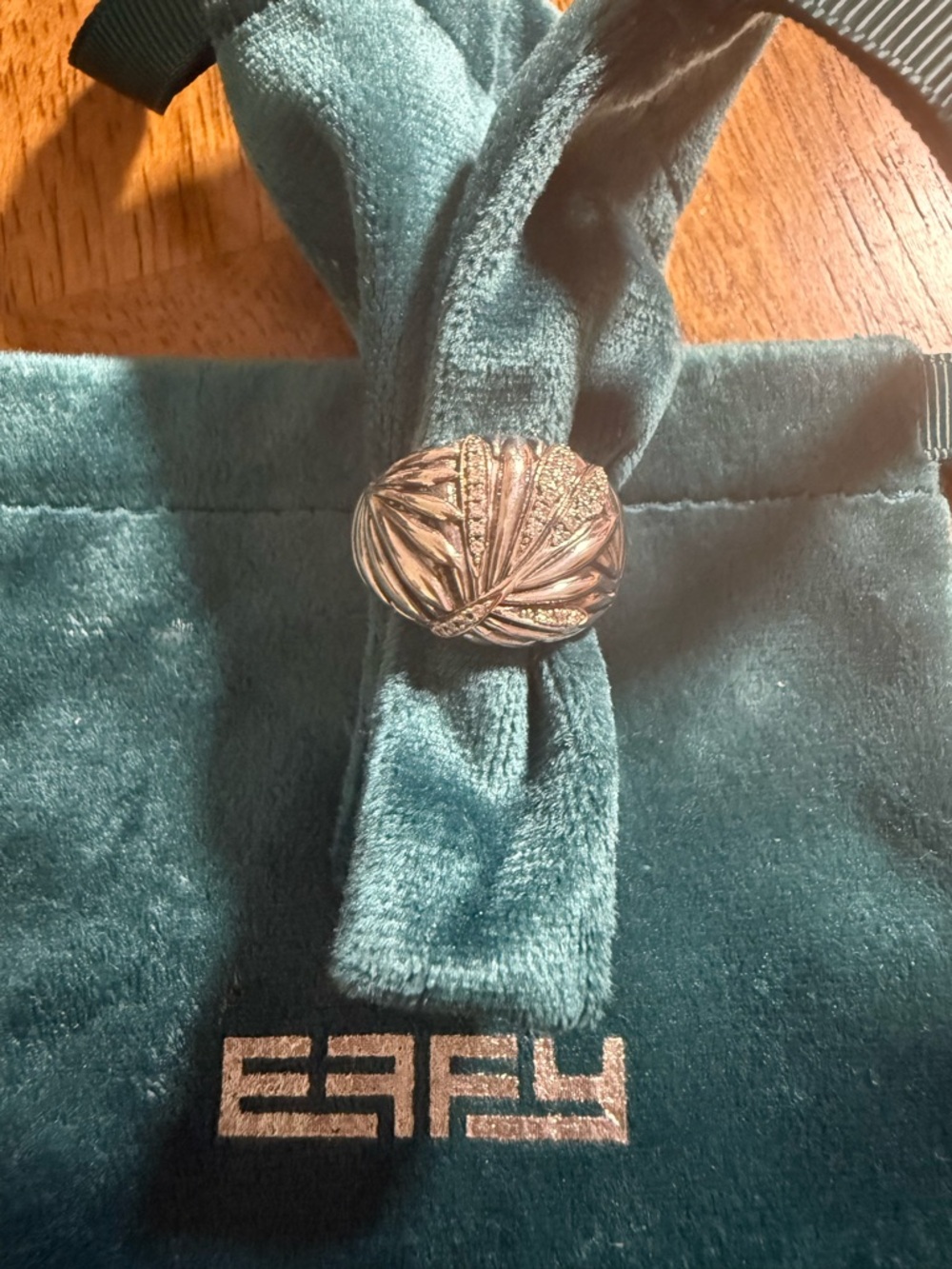Effy Sterling silver ring with palm from design and diamonds.
